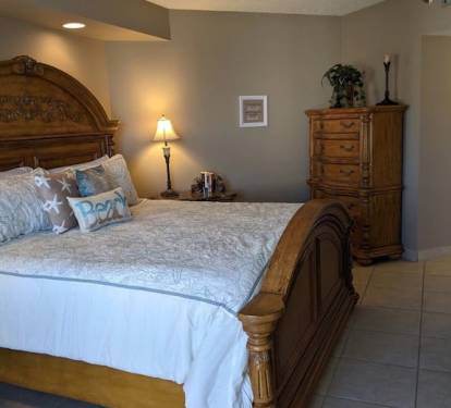 Master bedroom standing at sliding balcony door