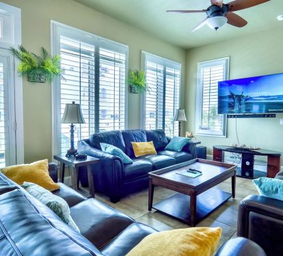 Living room with an access to the balcony on the second floor
