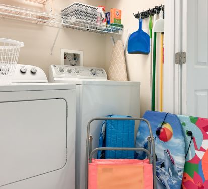 Full sized washer/dryer with a box of things you may need..plus beach supplies