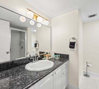 This attached bathroom is perfect for guests staying on the main level&mdash;easy, accessible, and equipped with everything you need for a comfortable stay.