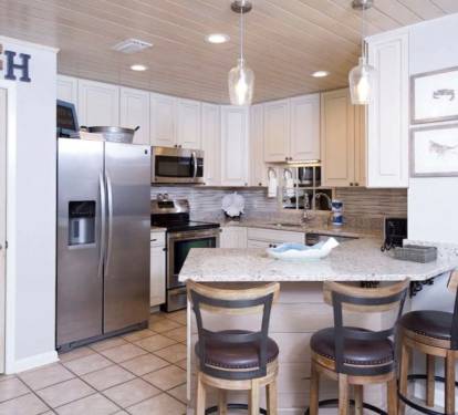 Bar seating for 3 in this beautifully remodeled kitchen! 