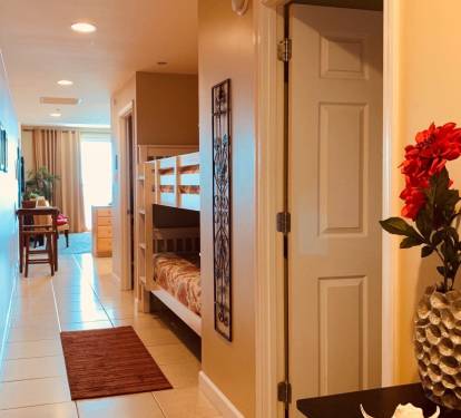 Two comfortable Bunk Beds in hallway.