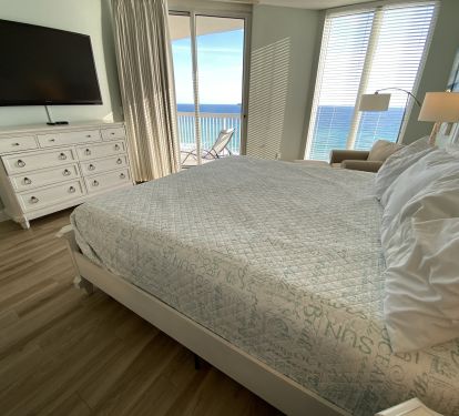 Bdrm 1- Master suite with floor to ceiling endless water views.