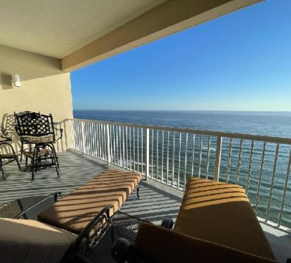 2 Louge Chairs and Bar Table and Chairs on spacious balcony