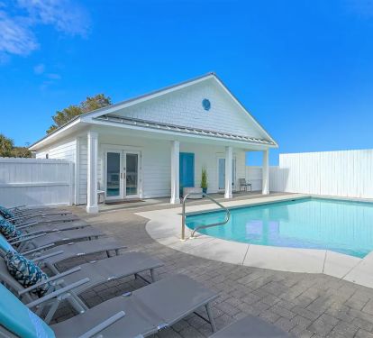 Epic-6  fenced pool with outdoor dining and grilling area is perfect for all to gather 'round.