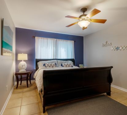 Master bedroom has king size bed, flat screen tv closet space and en-suite bath