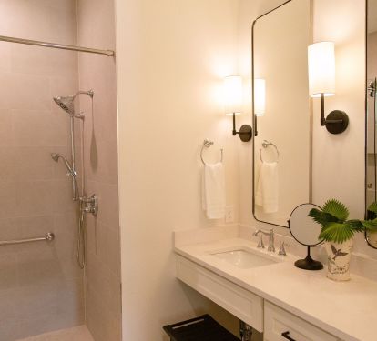 1st floor on-suite bath with grab bars and roll under sink for mobility impaired