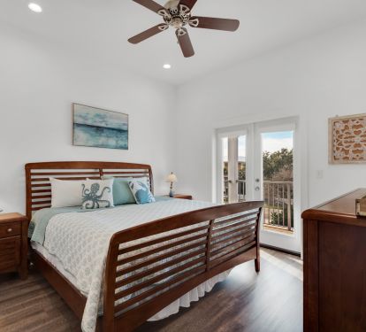 King Bedroom with private bathroom and access to deck overlooking front