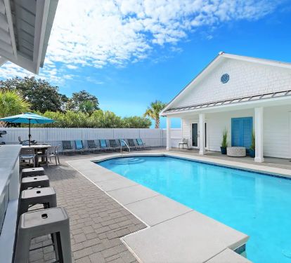 Epic-10 kitchen opens up directly to its outdoor dining area to make al fresco dining a snap!
