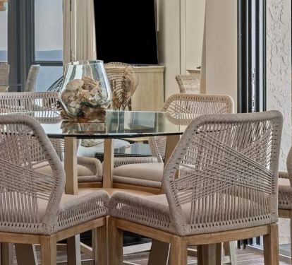 1st Large round table seats 6. 2nd Round table seats 4. Balconies seat 8 total. 