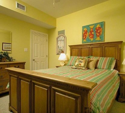Your queen bedroom awaits with entry floor access