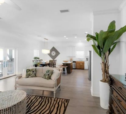 Epic-15 double french doors create an open flow to its huge outdoor seating area.