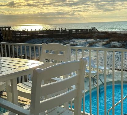 Walk out to a private deck from the main living area to enjoy ocean views!.