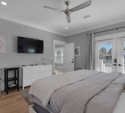 French doors let in natural light or use the blackout curtains to sleep in.