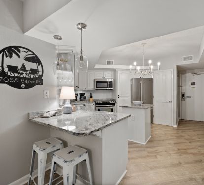 Elevated kitchen has what you need including a new stove. 