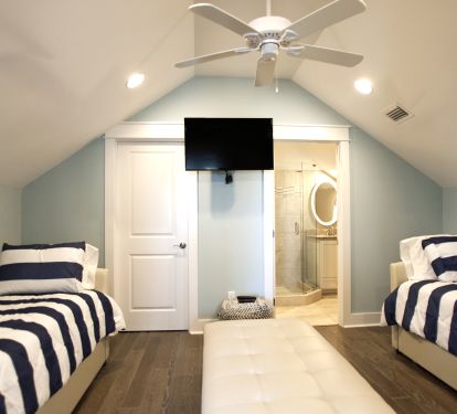 3rd floor Twin bedroom with a private full bath. Both twin beds have trundles!