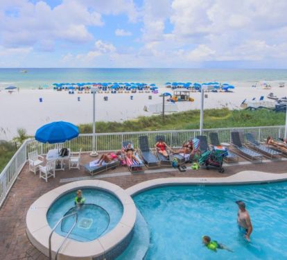 Beachfront pool and hot tub overlooking the Gulf with ocean views