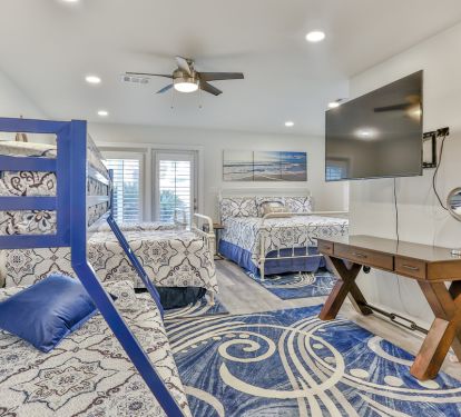 1st floor ensuite (tub) bdr with twin over full, 2 twins, and king bed - door to pool