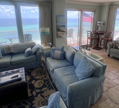 Living room with access to our wrap around balcony &amp; view of Gulf &amp; beach