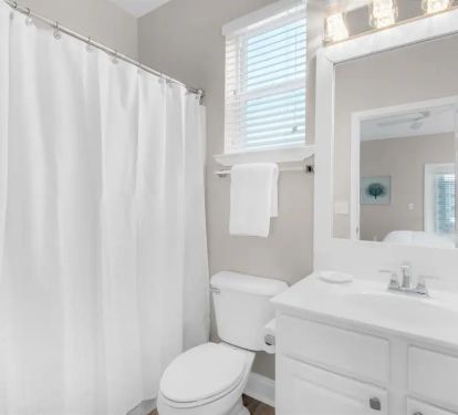 Splash-18...1st floor. Bedroom 1, Private full bath with tub/shower combo.