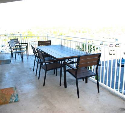 large balcony w/ views of the gulf &amp; bay. accessible from both bedrooms &amp; living