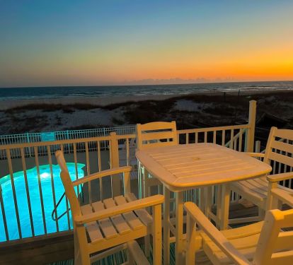 Twilight on your private deck with ocean and pool views!