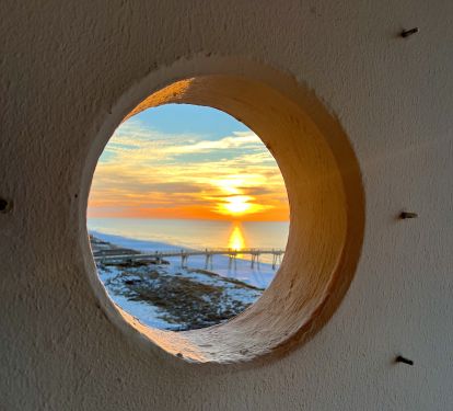 Sunrise on the Balcony through the Porthole