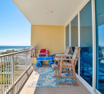 huge balcony with tall seating for sipping coffee and watching the dolphins