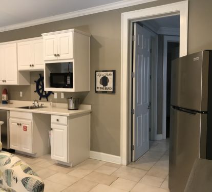 Downstairs kitchenette with 2nd full size frig, sink, micro etc