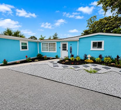Front of the home with plenty of parking 