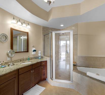 Master bath with double sinks, shower and garden tub to relax in