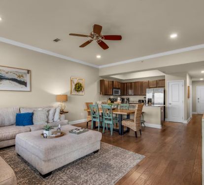 Super comfy couch in living room and ample seating