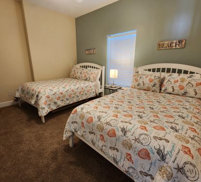  Double beds in 2nd bedroom to offer flexibility in sleeping arrangements.