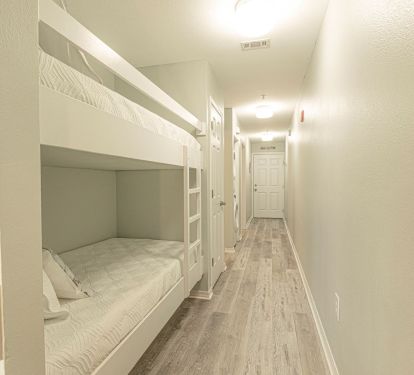 Bunk Beds with upgraded mattresses and foam toppers in hallway