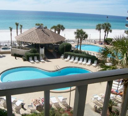 Beautiful view from balcony of pools, gazebo and ocean!