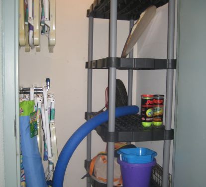owner's cupboard with beach items for free guest use on the beach