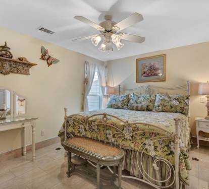 Master Bedroom with Ceiling Fan and an Adjoining Master Bathroom (King Bed)