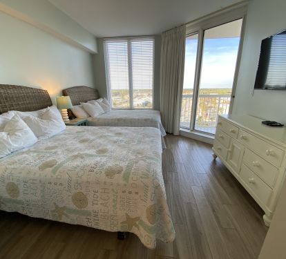 Bdrm 3- Two adult length queen sized beds, 50 inch Tv.