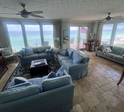 Living room with access to our wrap around balcony &amp; view of Gulf &amp; beach