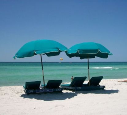FREE BEACH SET UP (TWO LOUNGES AND ONE UMBRELLA)  MARCH 1 TO OCT 31ST 