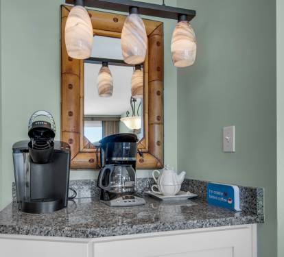 Coffee bar with Mr. Coffee and Keurg coffee maker.