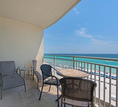 Fifth Floor Balcony with two chaise lounges and bistro set