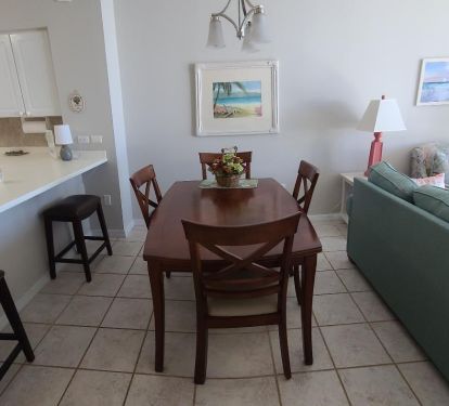 Dining table can seat 6 plus 2 counter stools.