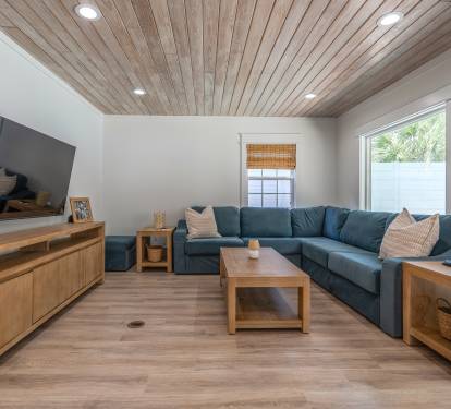 Large, comfy sectional to relax after a day in the sun.