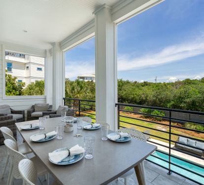 2nd Floor Back Porch Balcony with Dining Table &amp; Comfy Chairs