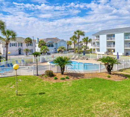 Tradewinds pool, large deck space, beach is just beyond the pool!