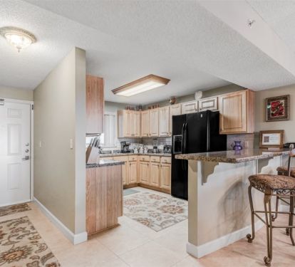 Entranceway, Kitchen and Breakfast Bar Areas