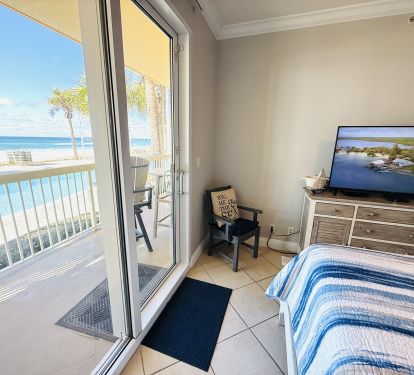 What a view from the pillow! Watch TV, pool &amp; the beach all at the same time!
