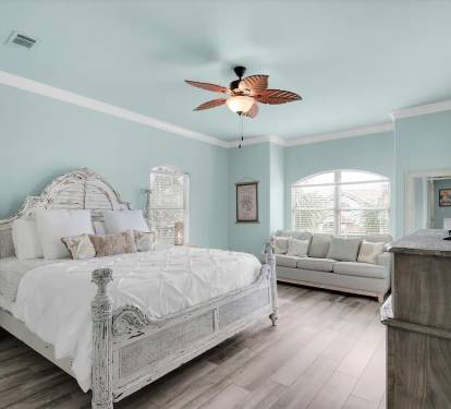 Seafoam-24 IInd floor king master suite with private full bath, private balcony, and sitting area with sleeper sofa.