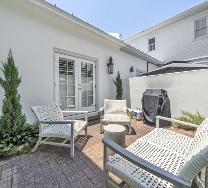 Private courtyard from master bedroom.  Comfortable seating and gas grill.